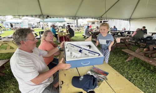 Jesse shows off his new plane to RC experts  Lesley and Clint