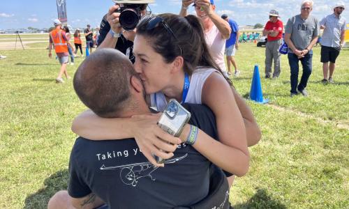 Matt did not know his girlfriend would be there to meet him!