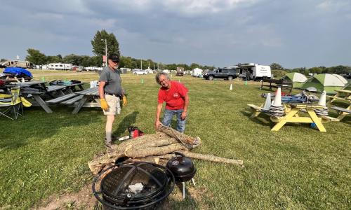 Charlie cutting wood for us